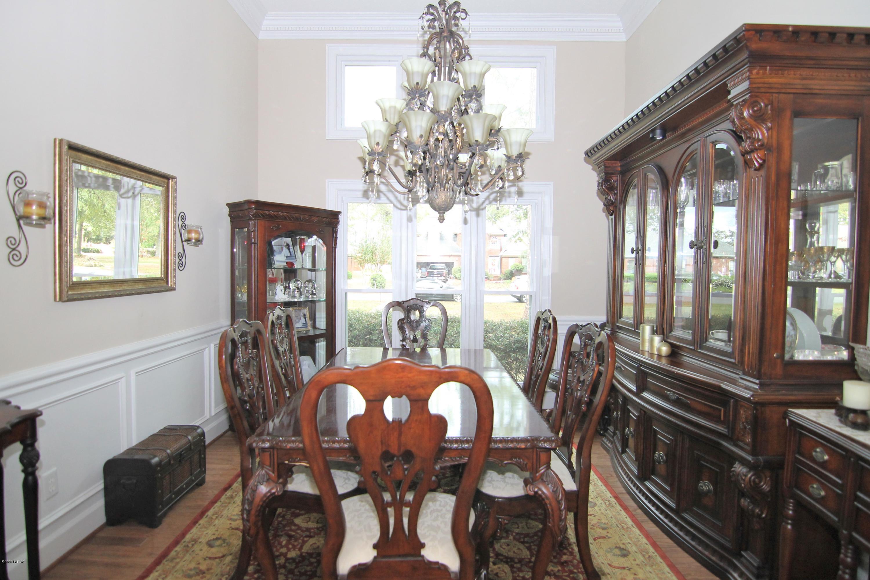 205 Cedar Ridge Drive Perry, GA 31069 - Photo 6 of 39 a view of a dining room with furniture window and outside view