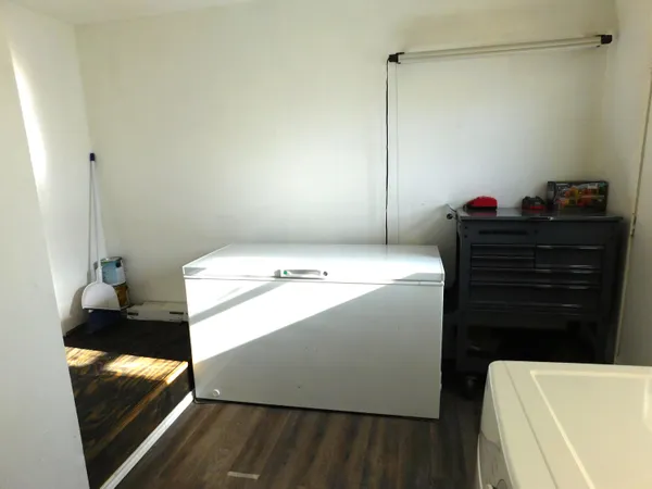 a utility room with washer and dryer