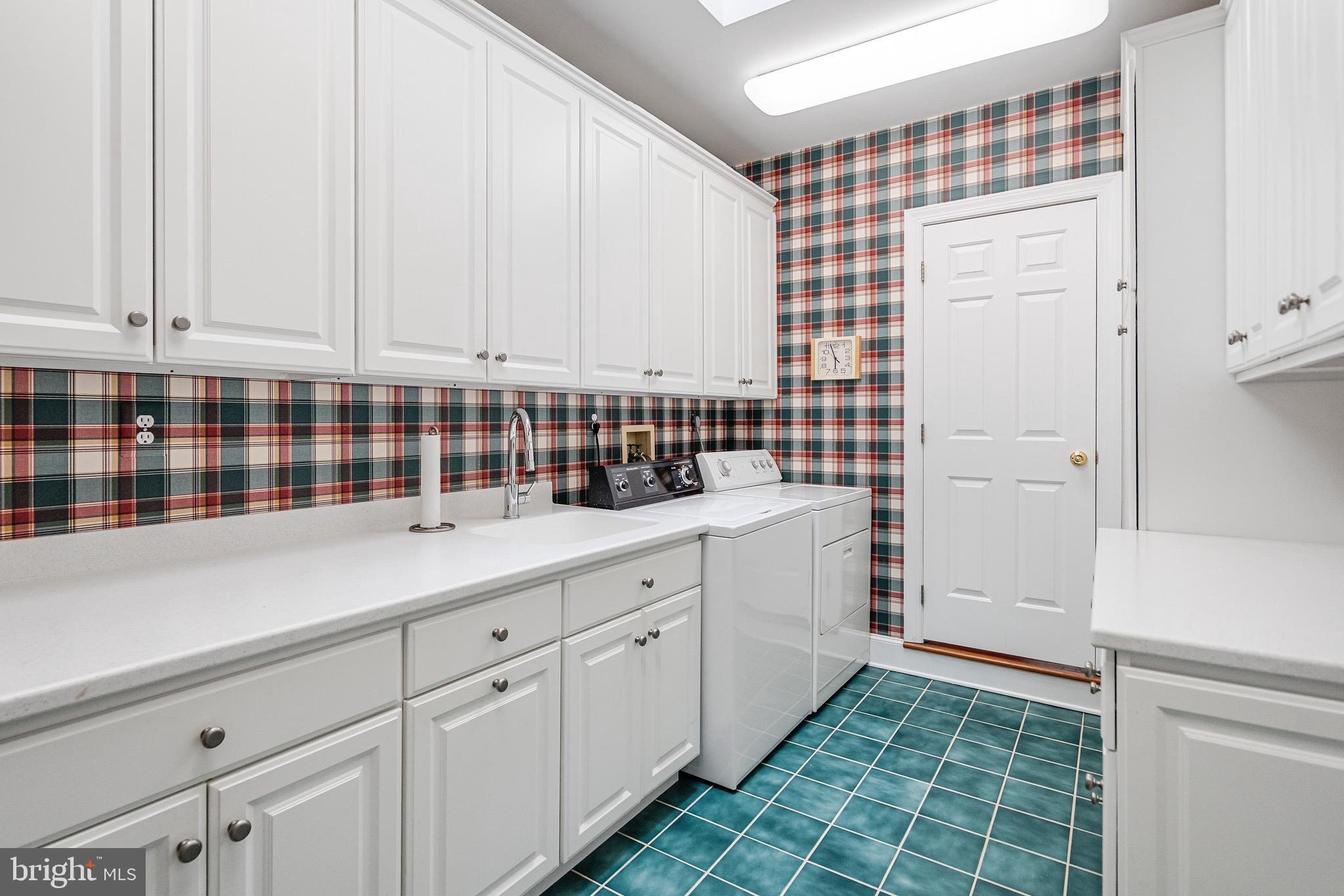 965 St Stephens Church Road Gambrills, MD 21054 - Photo 18 of 43 a kitchen with a sink and cabinets