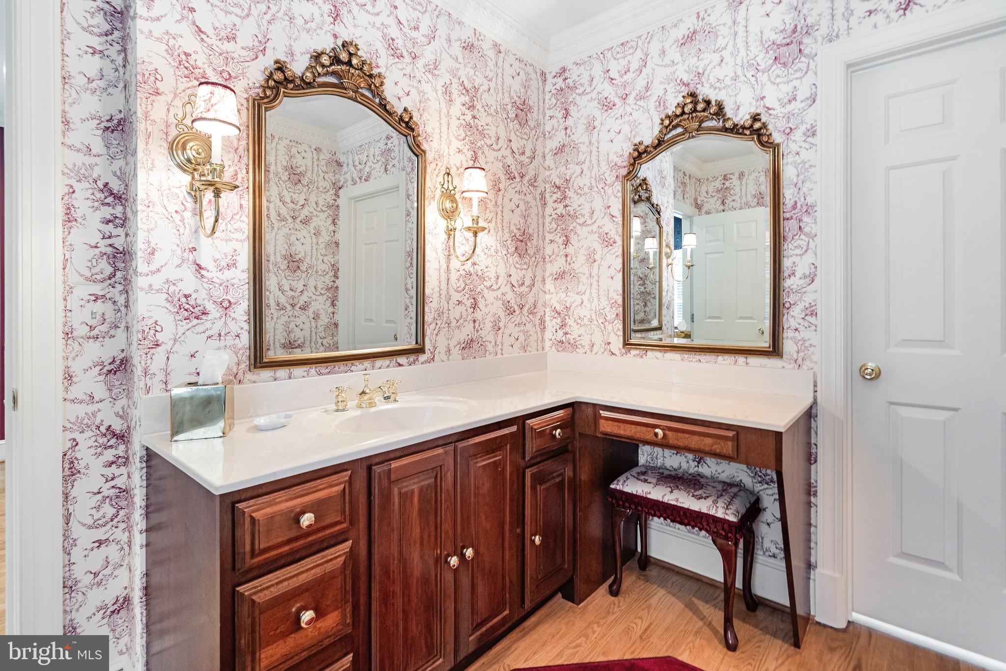965 St Stephens Church Road Gambrills, MD 21054 - Photo 20 of 43 a bathroom with a sink mirror and vanity
