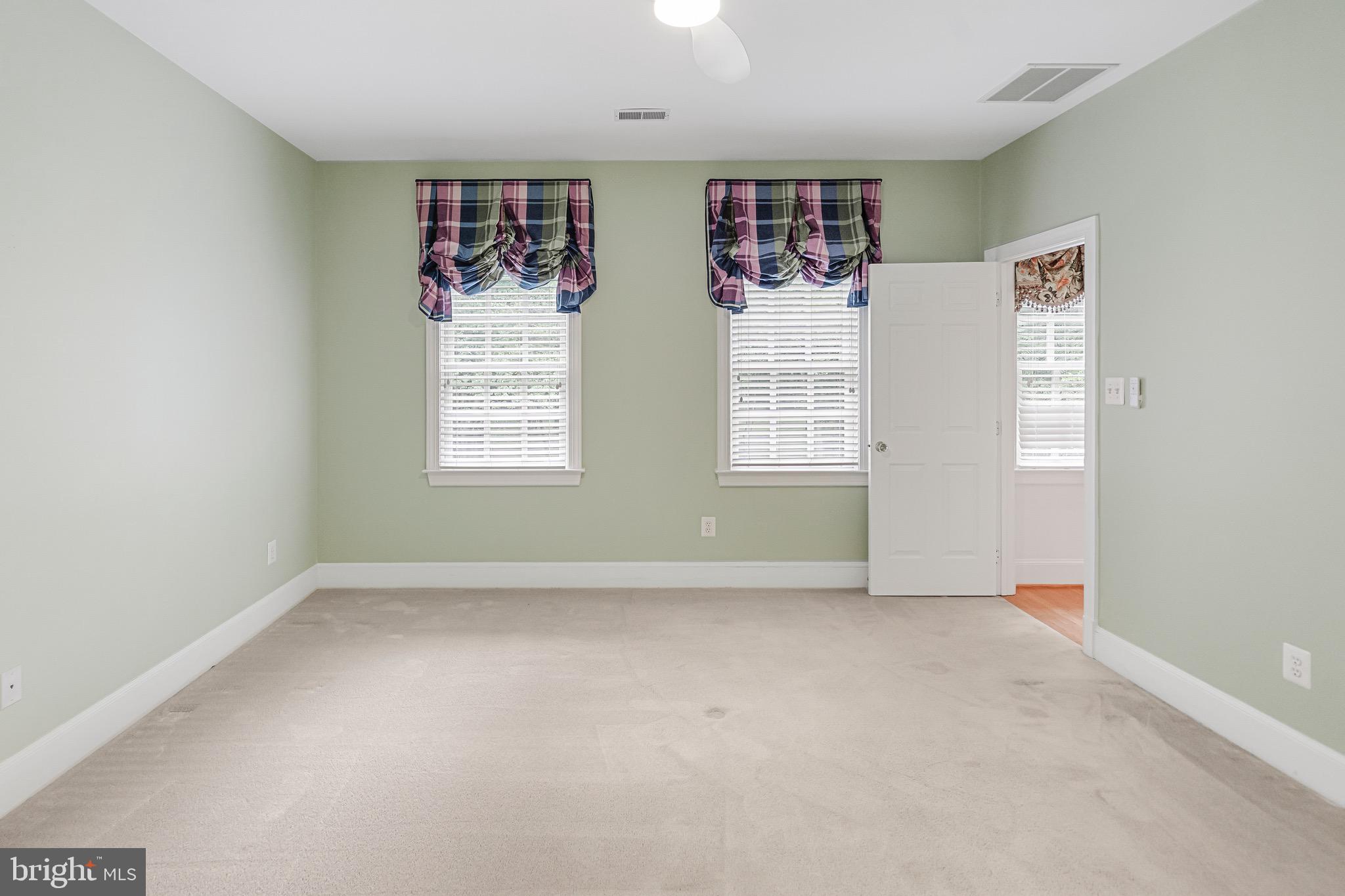 965 St Stephens Church Road Gambrills, MD 21054 - Photo 28 of 43 an empty room with windows and closet