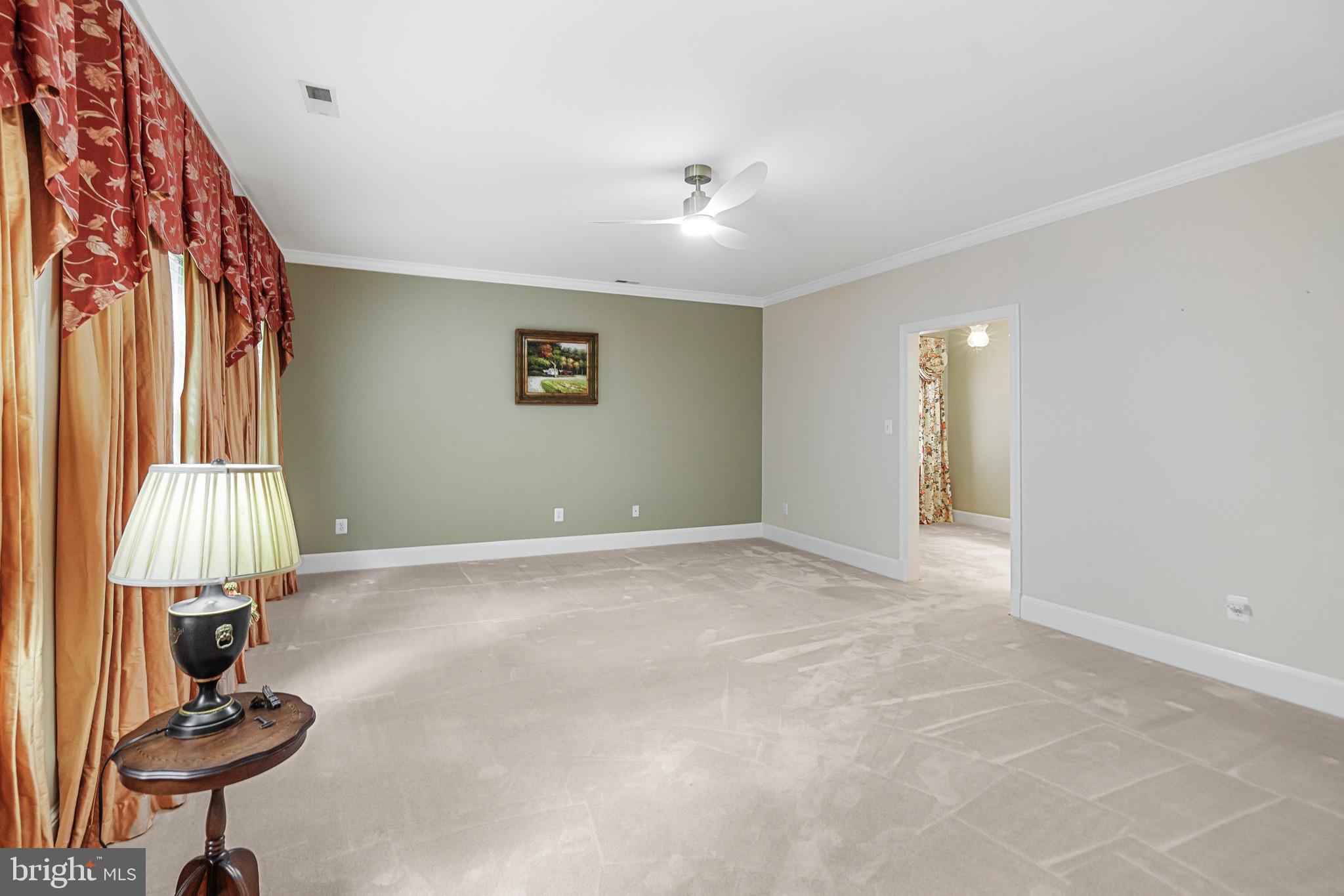 965 St Stephens Church Road Gambrills, MD 21054 - Photo 33 of 43 a view of empty room with a window and a lamp