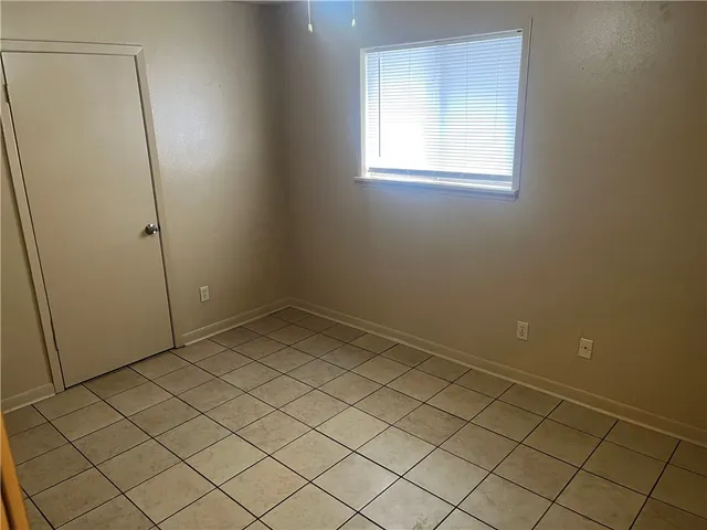 an empty room and a window