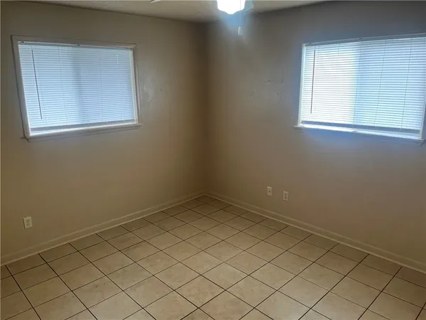 an empty room with windows