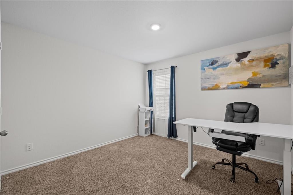 217 Redbarn Lane Caddo Mills, TX 75135 - Photo 5 of 17 a workspace with furniture and lamp