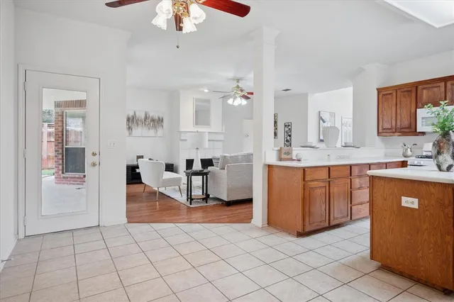 a view of a dining room with furniture wooden floor and chandelier