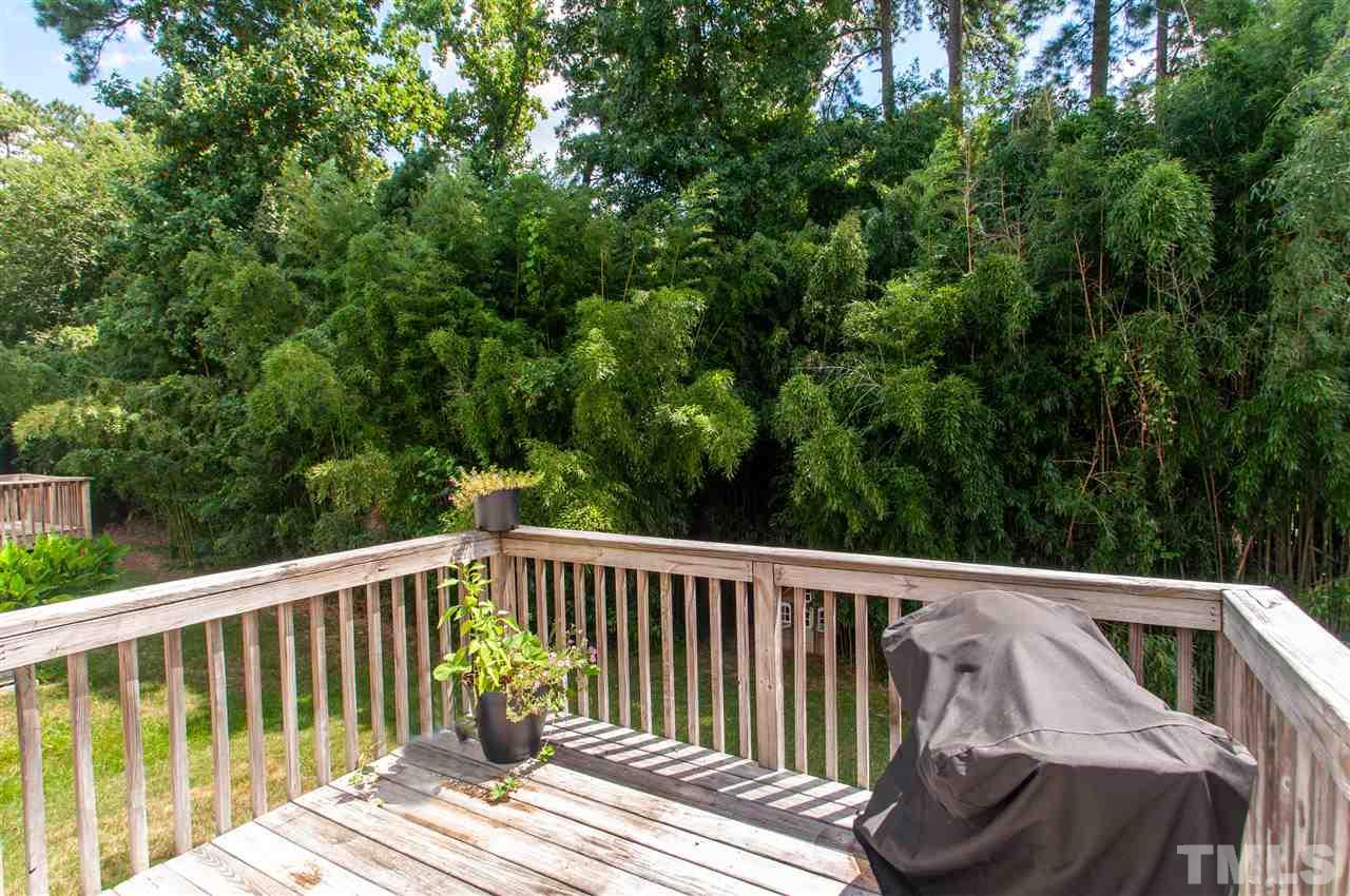5802 Sea Fox Court Raleigh, NC 27616 - Photo 22 of 30 a view of balcony with wooden floor and fence