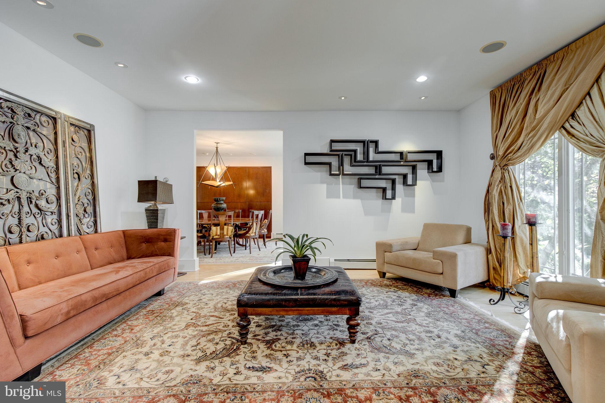 331 Sprague Road Narberth, PA 19072 - Photo 8 of 36 Living Room with floor to ceiling windows.
