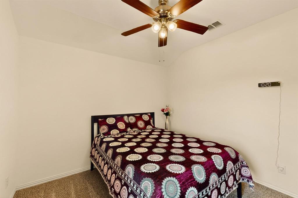 9144 St Barts Road Fort Worth, TX 76123 - Photo 25 of 36 Bedroom featuring carpet and ceiling fan