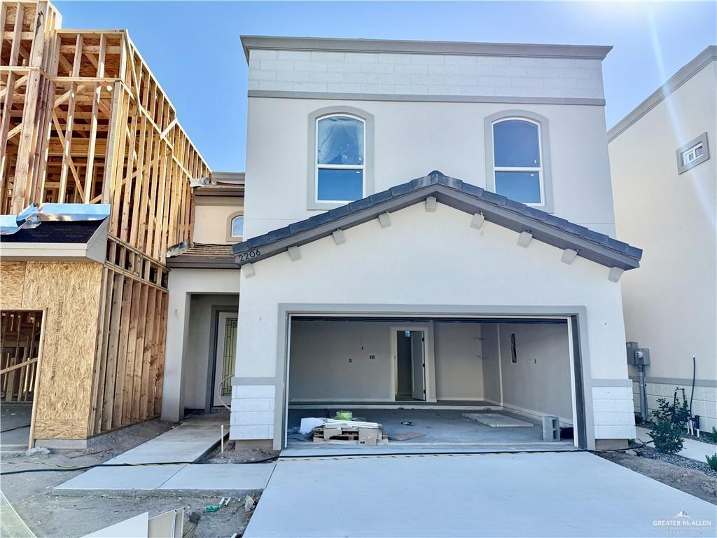 2206 Corales Street Mission, TX 78573 - Photo 1 of 17 a view of a building with entryway and front door