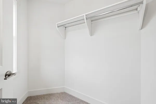 a picture of a table with chairs