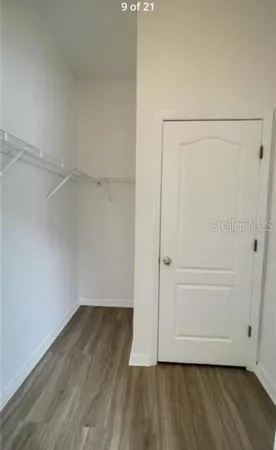 a view of small space with wooden floor