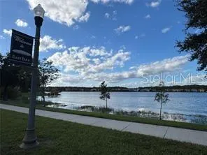 a view of a lake from a yard