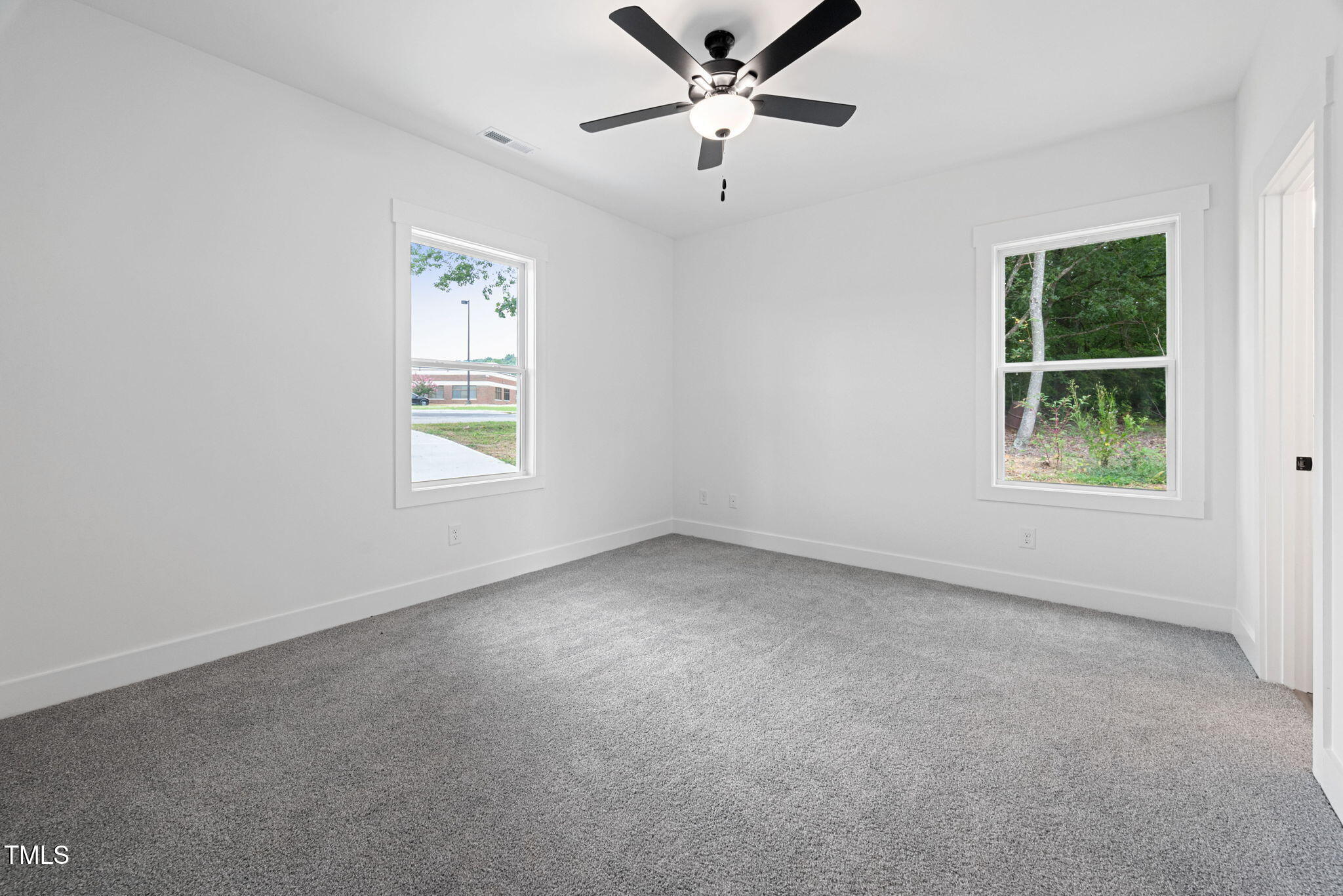 156 Southern Middle School Road Roxboro, NC 27573 - Photo 19 of 32 an empty room with a window