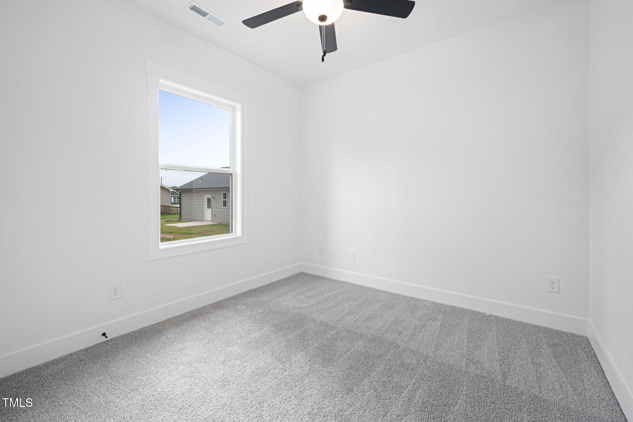 156 Southern Middle School Road Roxboro, NC 27573 - Photo 21 of 32 an empty room with a window