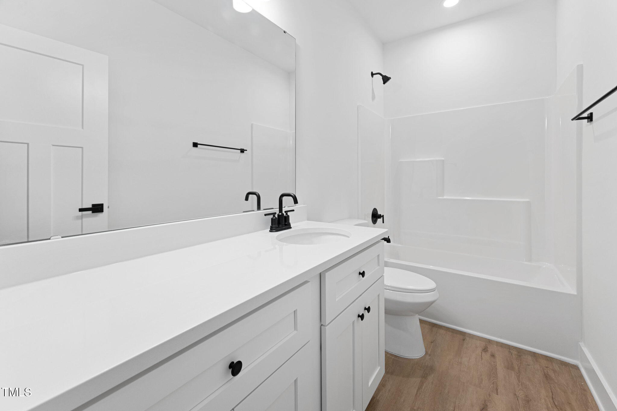 156 Southern Middle School Road Roxboro, NC 27573 - Photo 22 of 32 a bathroom with a sink a toilet and shower