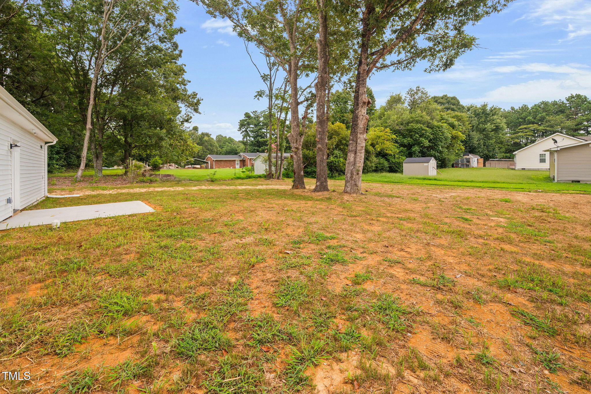 156 Southern Middle School Road Roxboro, NC 27573 - Photo 30 of 32 a view of a swimming pool with an outdoor space and seating area