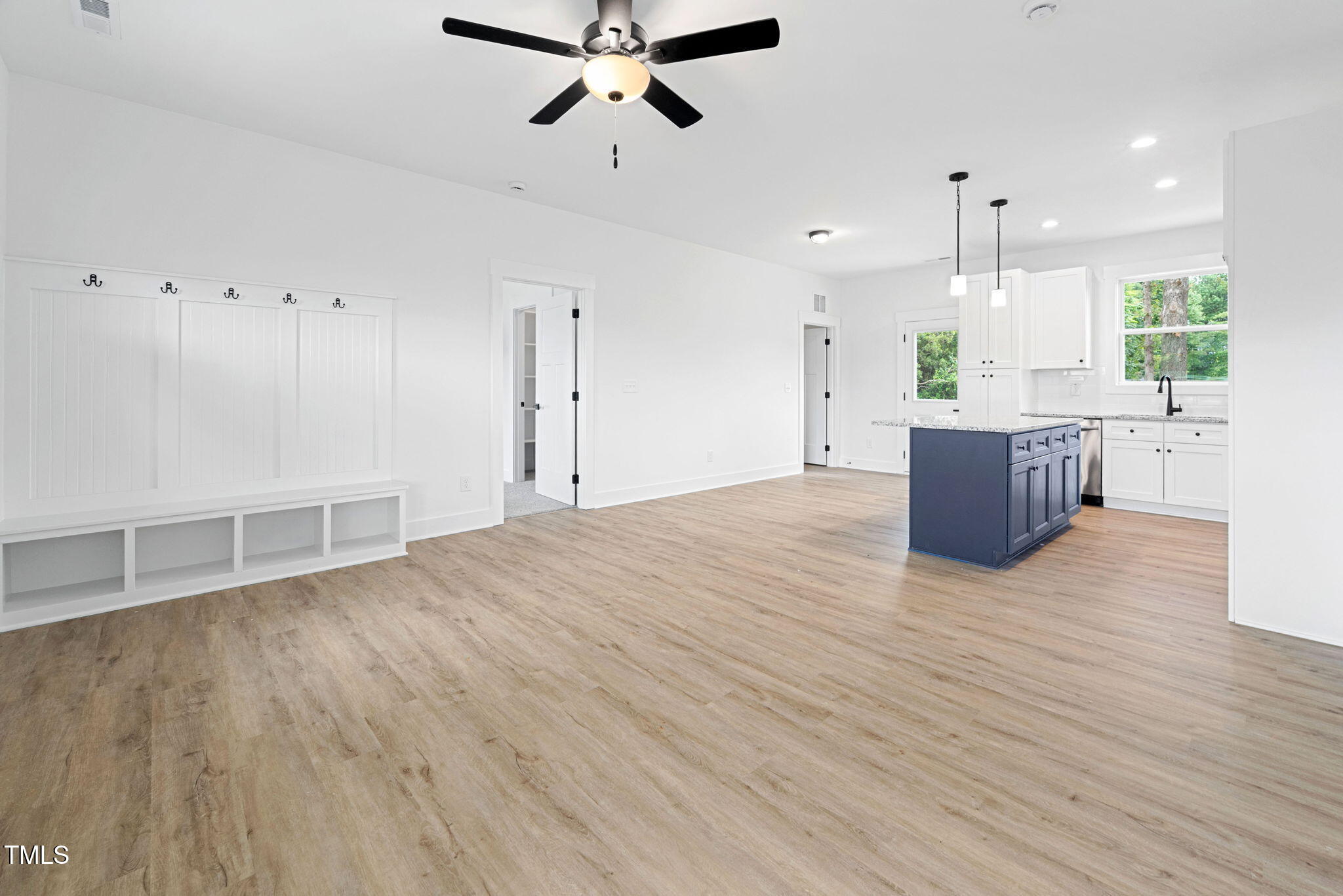 156 Southern Middle School Road Roxboro, NC 27573 - Photo 7 of 32 a view of empty room with wooden floor and window