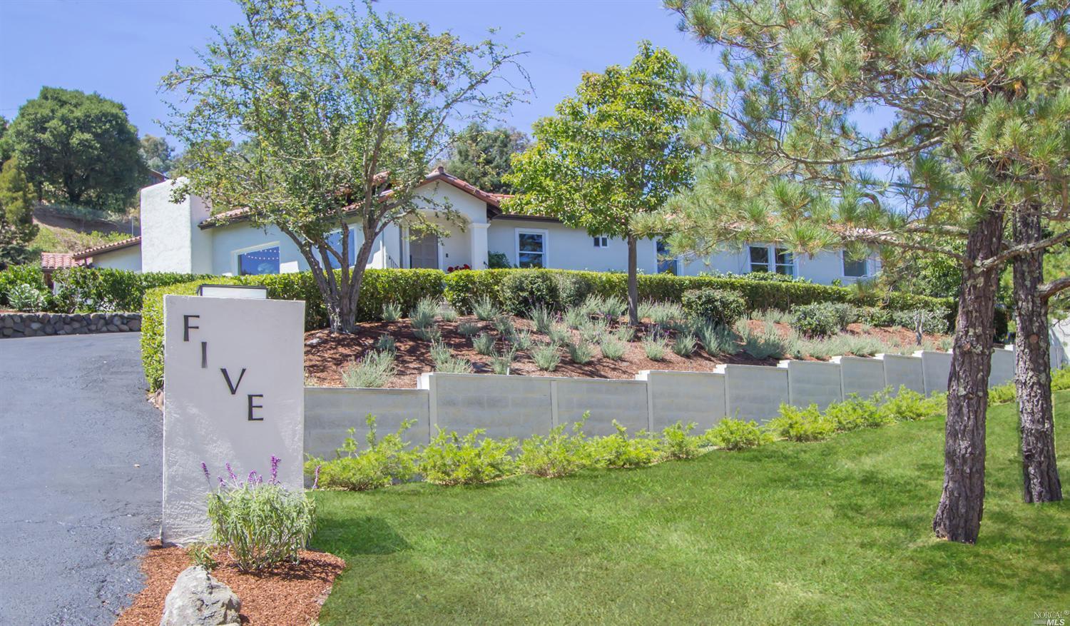 5 Pigeon Hollow Road San Rafael, CA 94901 - Photo 1 of 1 a front view of a house with garden
