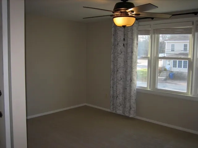 a view of a room with a window