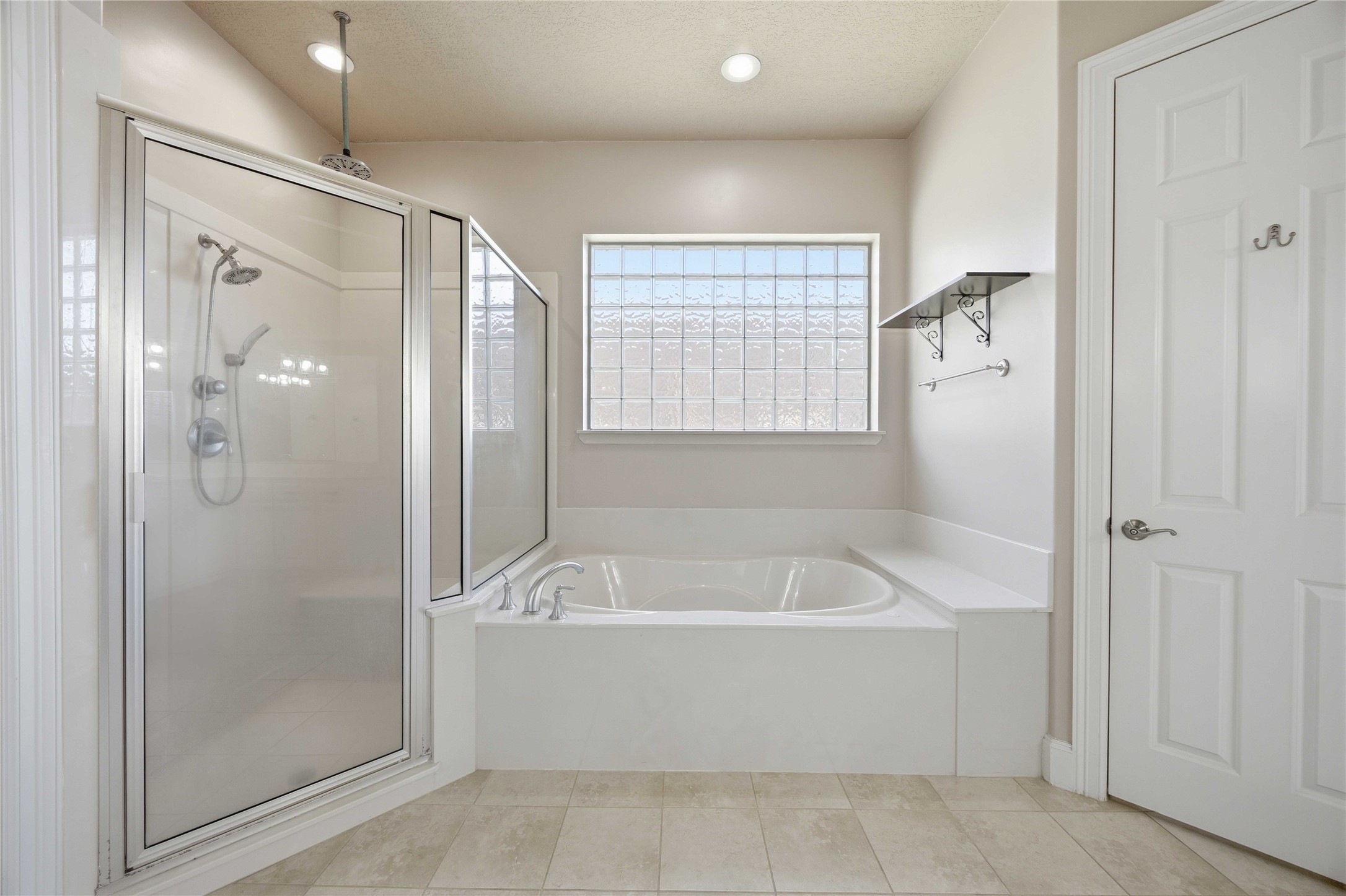 1930 Old River Road Montgomery, TX 77356 - Photo 24 of 49 The primary bath features a separate shower next to a jetted tub.