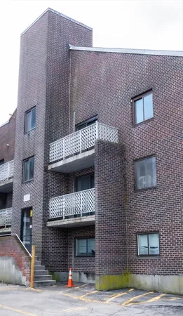 a front view of a house with stairs