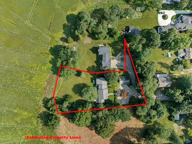 a kitchen with stainless steel appliances granite countertop sink stove and refrigerator