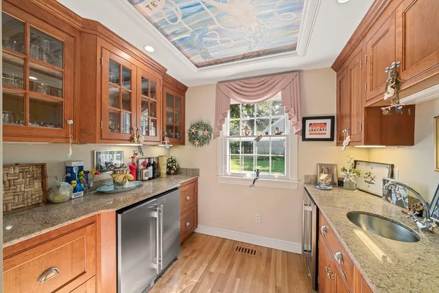 a living room with furniture fireplace and flat screen tv