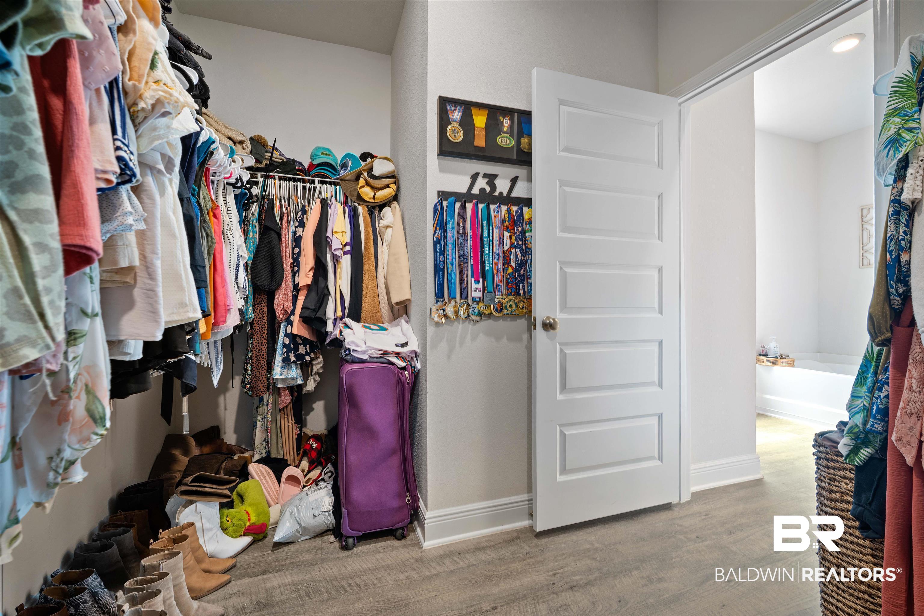 11021 Native Dancer Way Daphne, AL 36526 - Photo 15 of 35 Walk in closet with wood finished floors