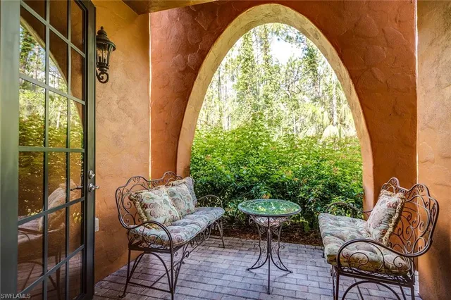 a view of balcony with furniture