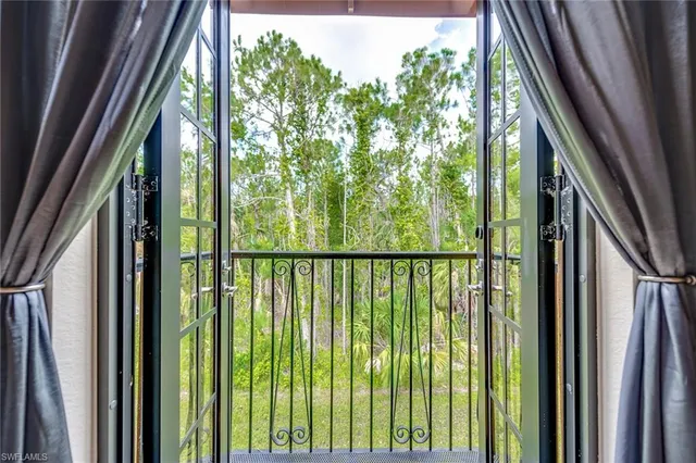 a view of a garden from stairs