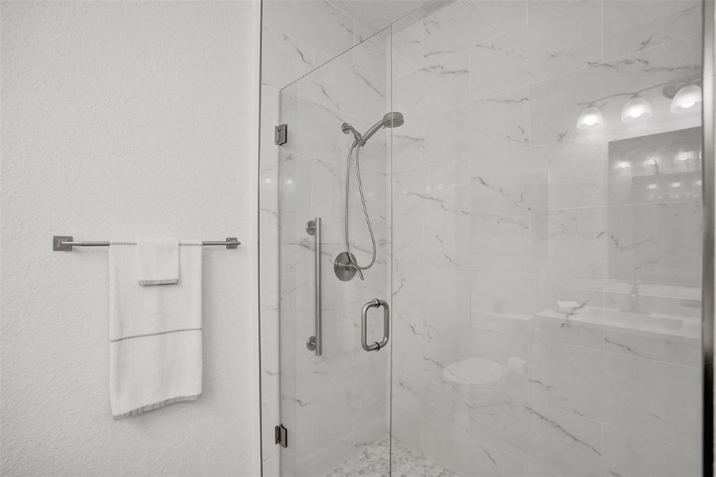7967 Exeter Boulevard East, Unit 203 Tamarac, FL 33321 - Photo 17 of 42 *** LUXURIOUS WALK IN SHOWER WITH A FRAMELESS SHOWER DOOR & CLASSIC WHITE & GRAY TILE ***
