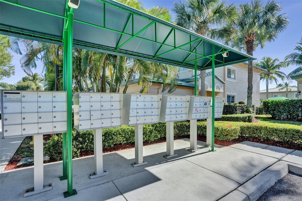 7967 Exeter Boulevard East, Unit 203 Tamarac, FL 33321 - Photo 34 of 42 *** ENJOY EASY ACCESS TO NEARBY MAILBOXES & GUEST PARKING JUST STEPS FROM THE HOME ***