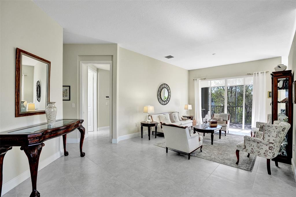 7967 Exeter Boulevard East, Unit 203 Tamarac, FL 33321 - Photo 6 of 42 *** TILE FLOORS THROUGHOUT - NO CARPET ***