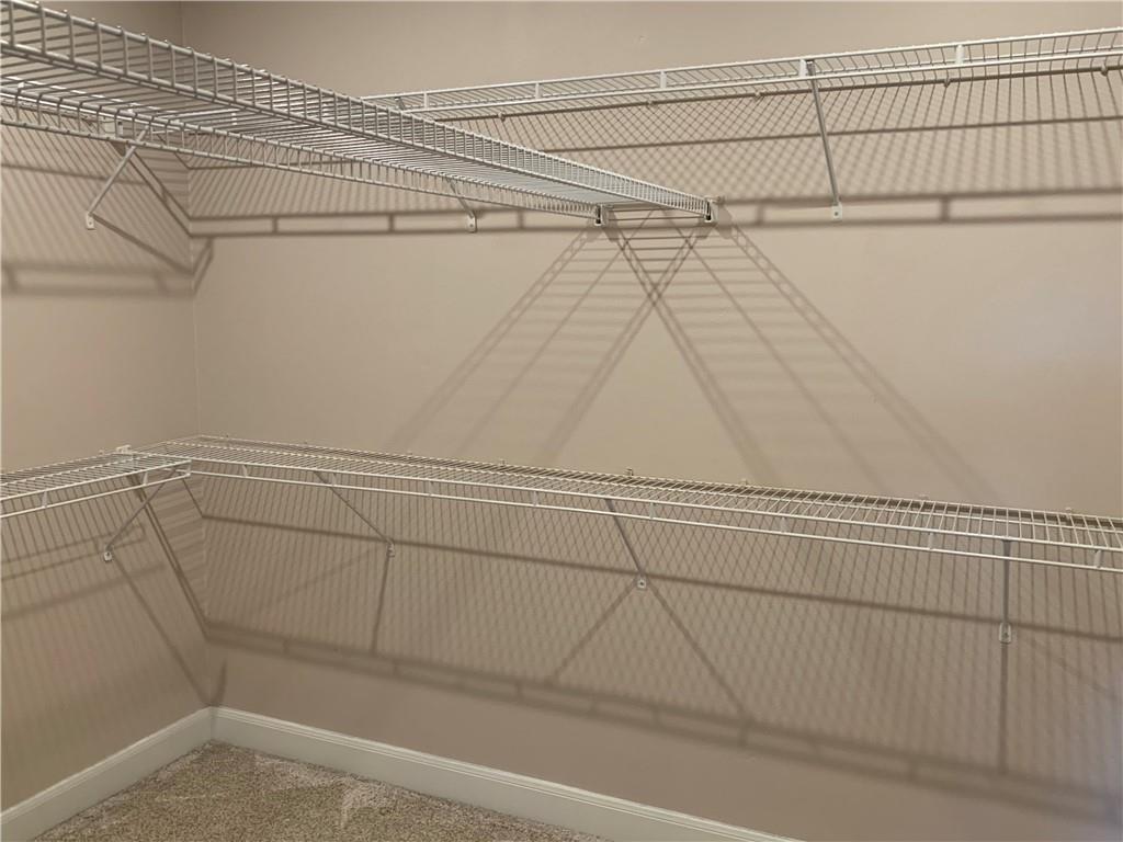 7701 Rialto Boulevard, Unit 1222 Austin, TX 78735 - Photo 9 of 14 Ample wire shelving maximizes storage in this well-appointed closet.
