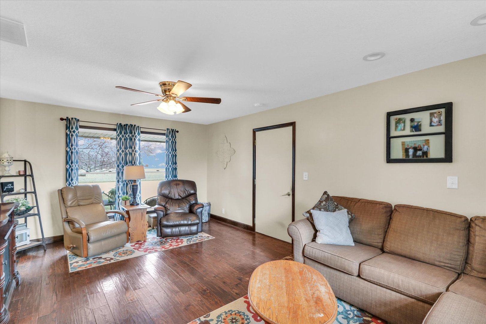 703 East Washington Street Tolono, IL 61880 - Photo 15 of 38 a living room with furniture and a large window
