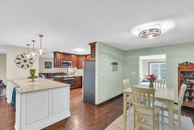 a view of a kitchen and dining room
