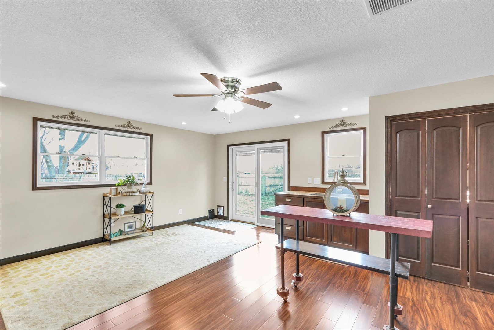 703 East Washington Street Tolono, IL 61880 - Photo 19 of 38 a living room with furniture window and wooden floor