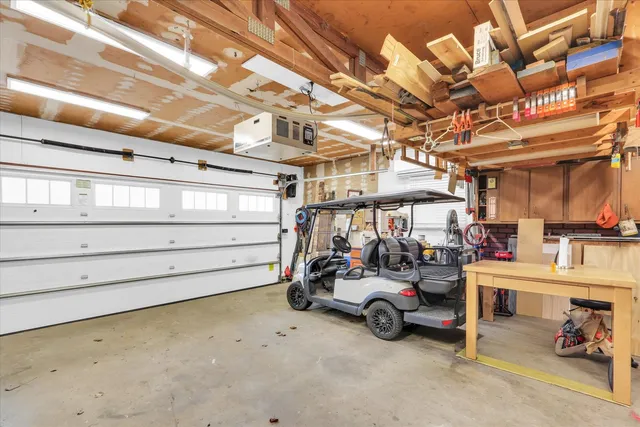 a view of parking garage with cars