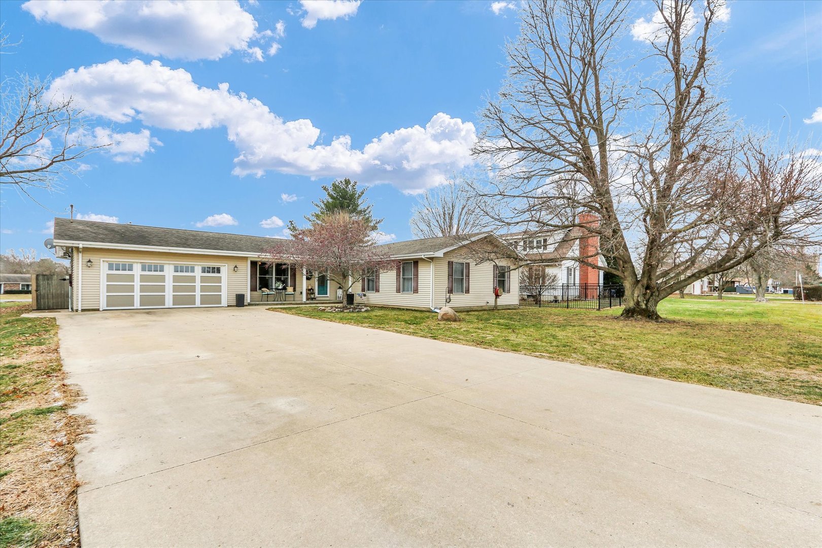 703 East Washington Street Tolono, IL 61880 - Photo 4 of 38 a front view of house with yard