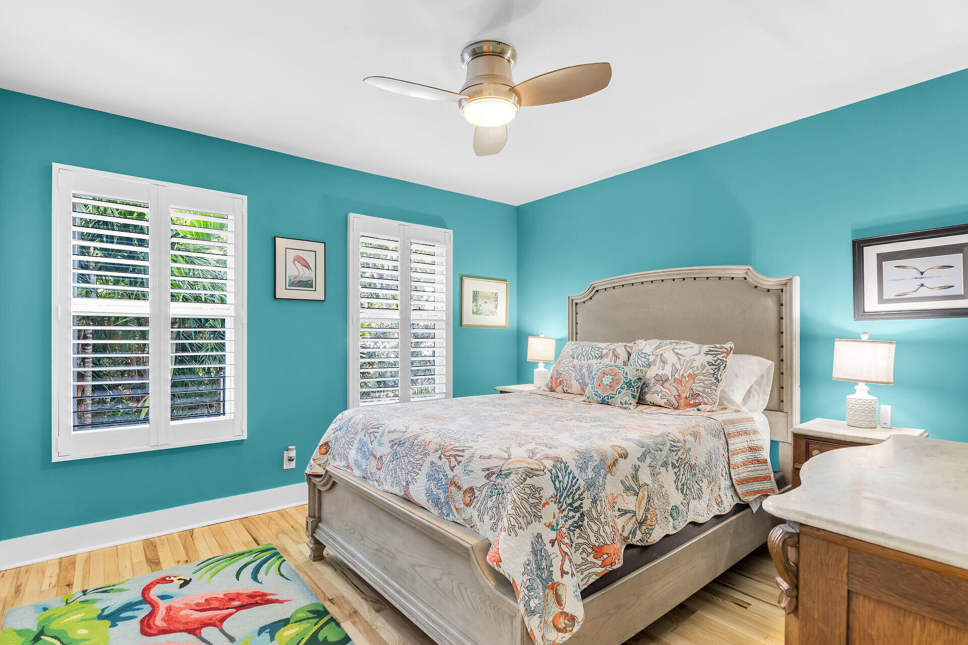 808 Virginia Street, Unit 4 Key West, FL 33040 - Photo 20 of 32 a bedroom with a bed and a chandelier