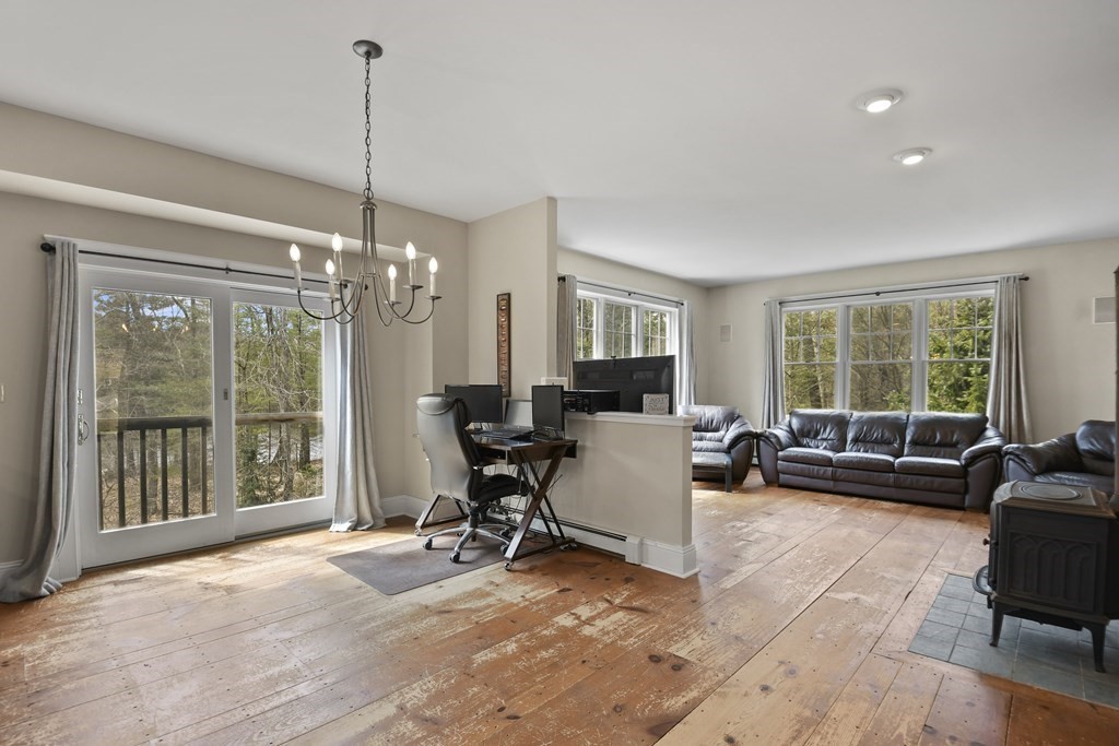 277 Secret Lake Road Athol, MA 01331 - Photo 14 of 36 a view of a livingroom with workspace and a window