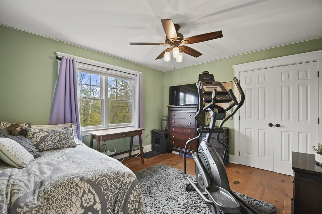 277 Secret Lake Road Athol, MA 01331 - Photo 25 of 36 a bedroom with a bed and a window