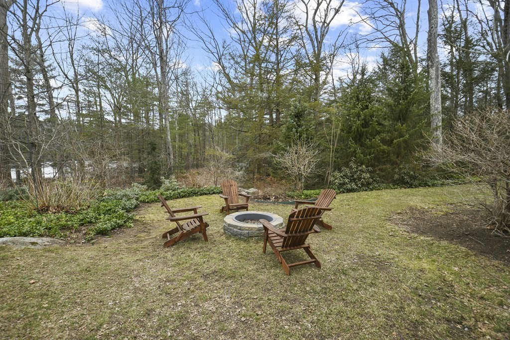 277 Secret Lake Road Athol, MA 01331 - Photo 32 of 36 a view of a backyard with sitting area