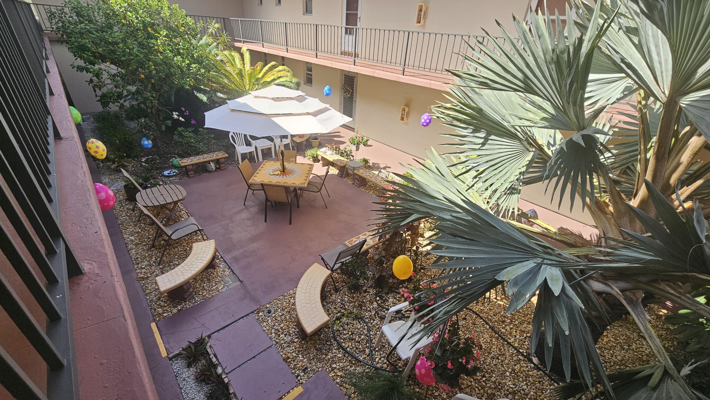 504 Davis Road, Unit 96 Palm Springs, FL 33461 - Photo 6 of 42 Garden Patio