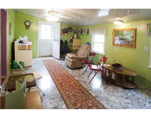43 Harding Street Old Town, ME 04468 - Photo 16 of 25 Living Room. Back exit from the home...