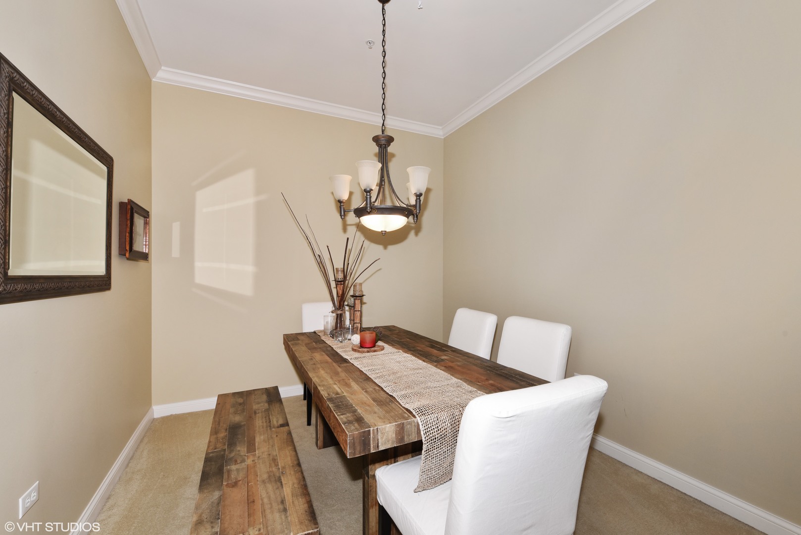 1000 Village Center Drive, Unit 312 Burr Ridge, IL 60527 - Photo 11 of 25 a view of a dining room with a table and chairs