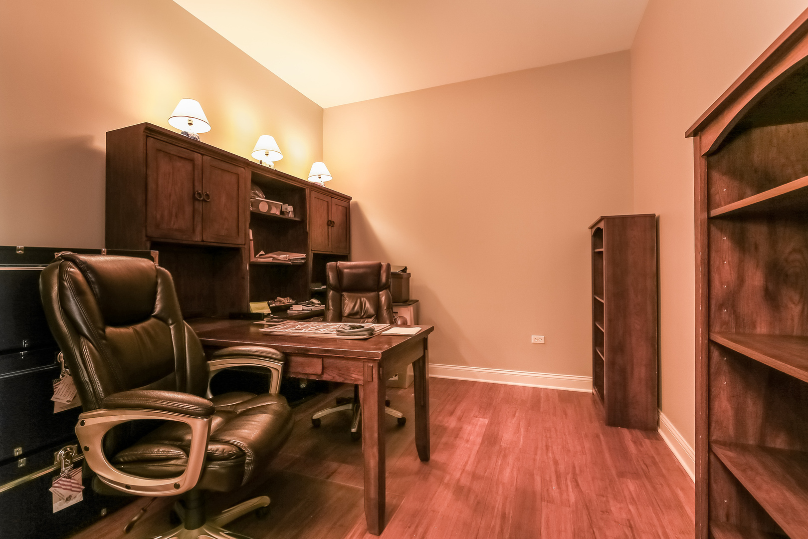 1000 Village Center Drive, Unit 312 Burr Ridge, IL 60527 - Photo 12 of 25 a workspace with furniture and wooden floor