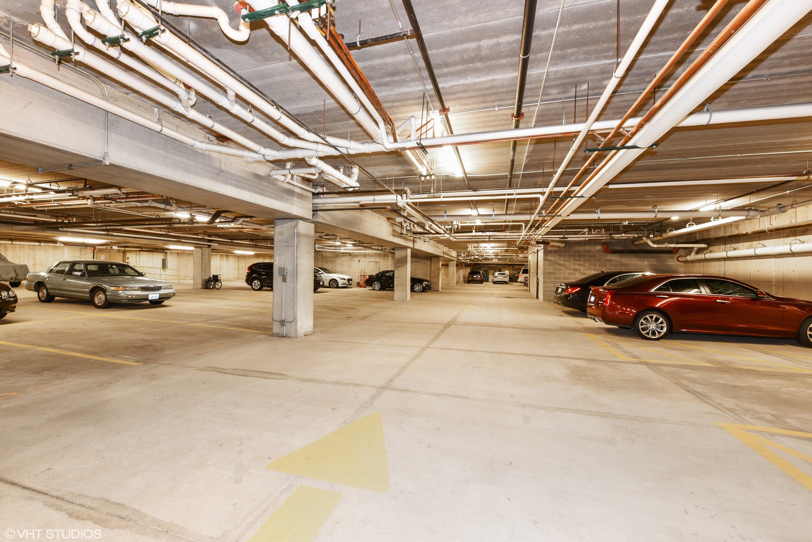 1000 Village Center Drive, Unit 312 Burr Ridge, IL 60527 - Photo 24 of 25 a view of parking garage with cars