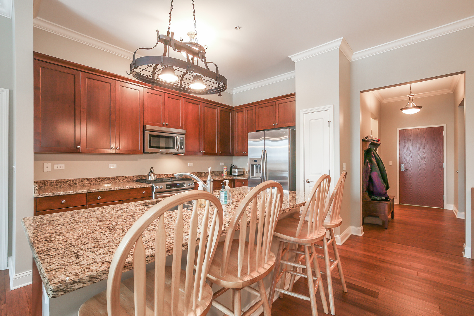 1000 Village Center Drive, Unit 312 Burr Ridge, IL 60527 - Photo 9 of 25 a very nice looking kitchen with a large window appliances and cabinets